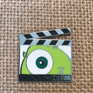TRADED Mike Slate/ClapBoard Enamel Pin